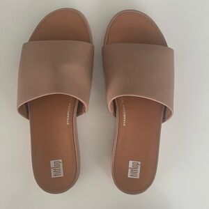 Fitflop Gracie leather slides, caramel color.